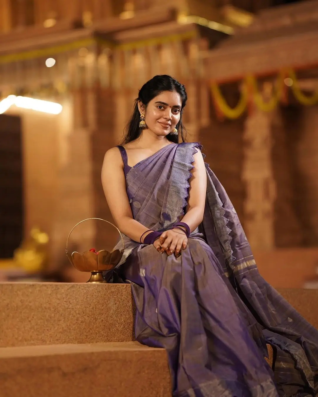 Kushita Kallapu In Traditional Violet Saree Sleeveless Blouse